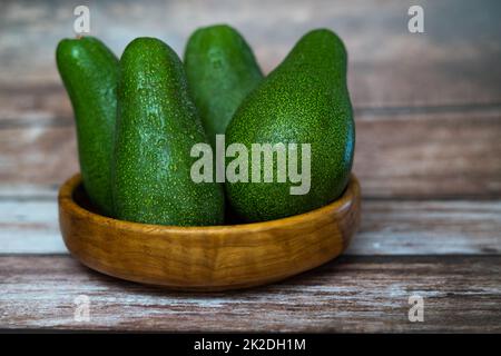 Parts Of Avocado Fruit On Wooden Chopping Board Stock Photo - Download  Image Now - Apple Core, Avocado, Biology - iStock