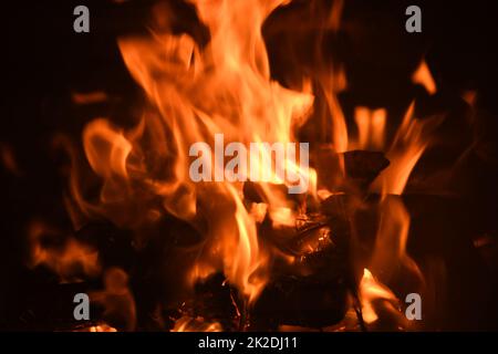 Cozy and warming log fire in the fireplace, in the province of Alicante, Spain Stock Photo