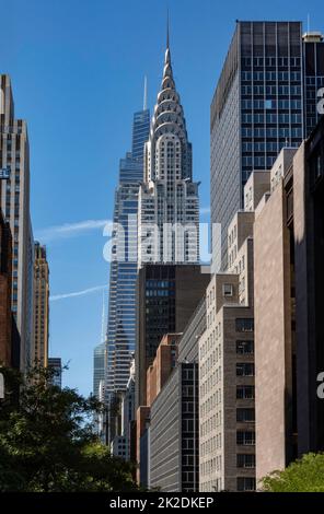 Canyon of skyscrapers along E. 42nd St. includes the Chrysler building and one Vanderbilt super tall, 2022, NYC, USA Stock Photo