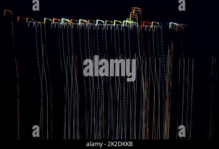 Streaks of light on a dark background Stock Photo