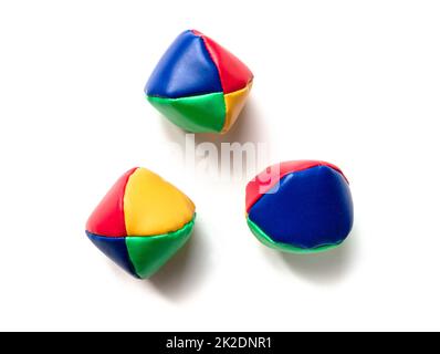 Colorful juggling balls isolated on white Stock Photo