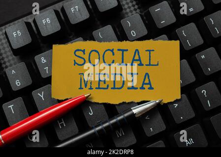 Text caption presenting Social Media. Internet Concept websites and applications enable users create and share content Creating New Online Cookbook, Typing And Sharing Cooking Recipes Stock Photo