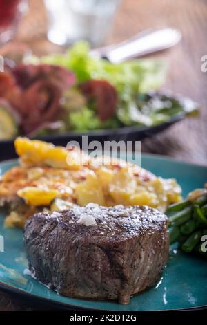 steak with potato gratin Stock Photo