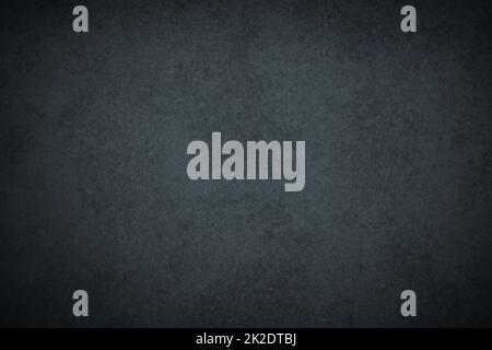 Dark gloomy black grunge surface background with vignette Stock Photo