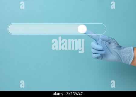 icon for searching and entering information and a hand in a blue medical glove. Virtual lane for loading Stock Photo
