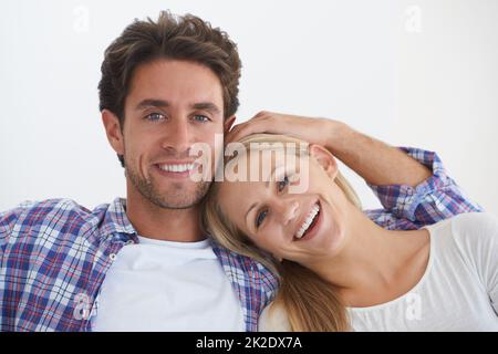 Just the two of us. Cropped shot of a happily married couple at home. Stock Photo