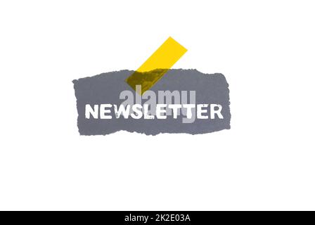 Isolated grunge paper background with yellow adhesive tape: Newsletter Stock Photo