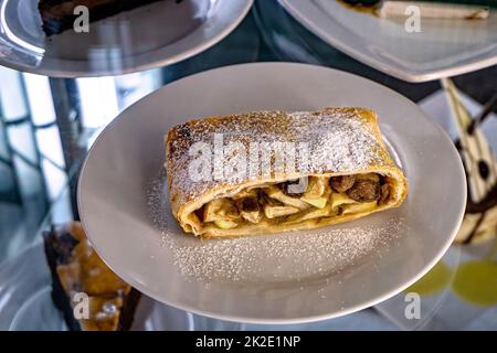 Apple strudel on a plate as served in Prague Stock Photo