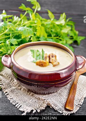 Soup puree of chanterelle in bowl on napkin Stock Photo