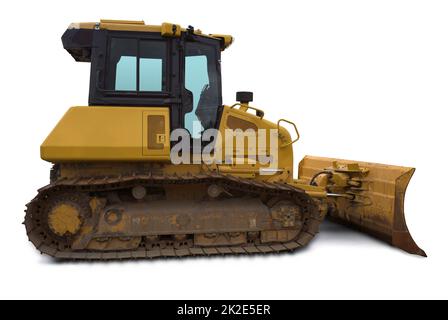 construction yellow heavy equipment bulldozer track excavator earth mover on white background Stock Photo