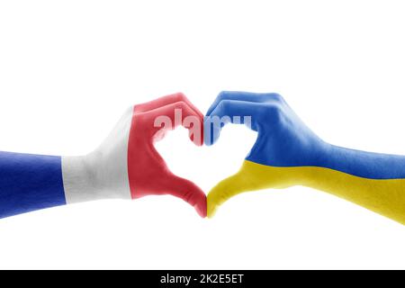 Two hands in the form of heart with French and Ukrainian flag isolated on white background Stock Photo