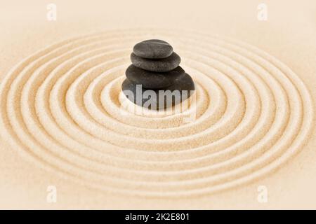 Zen japanese garden and black stones background Stock Photo