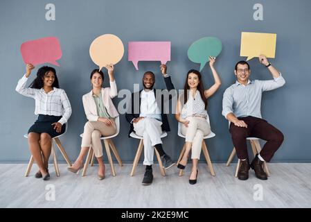 Confident Business Team Against Abstract Glowing Black Background Stock 