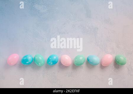 Row of Easter eggs in row with copy space Stock Photo