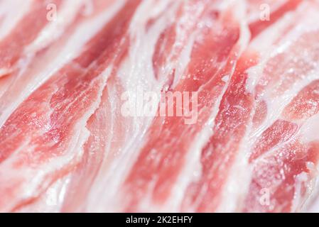 Closeup pack fresh bacon pork slices Stock Photo