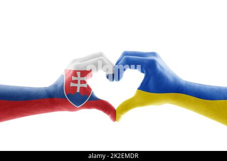 Two hands in the form of heart with Slovak and Ukrainian flag isolated on white background Stock Photo