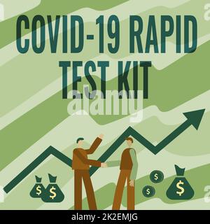 Sign displaying Rapid Test Kit. Concept meaning Emergency medical diagnostic equipment that deliver fast results Two Men Standing Shaking Hands With Financial Arrow For Growth And Money Bags. Stock Photo