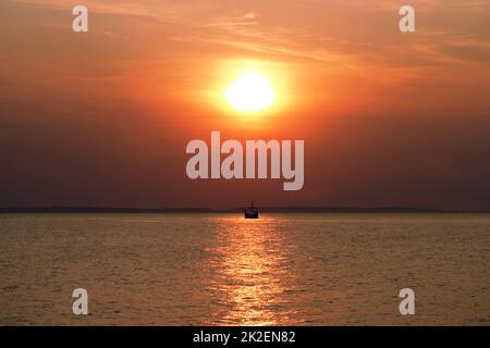 End of the day by the sea Stock Photo