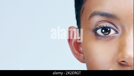 Were finally seeing eye to eye. Closeup beauty shot of a young womans eye. Stock Photo