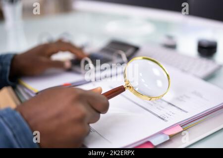 Fraud Investigation And Tax Audit. Investigator Or Auditor Stock Photo