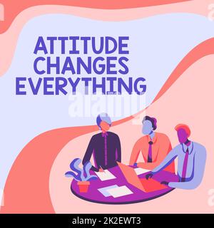 Hand writing sign Attitude Changes Everything. Word for Positive behavior achieve the business goal Colleagues Drawing Sitting On A Desk With Laptop Having Discussion. Stock Photo