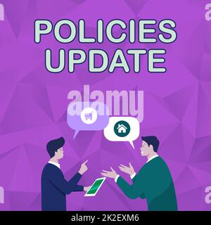 Writing displaying text Policies Update. Word for act of adding new information or guidelines formulated Two Men Colleagues Standing Sharing Thoughts Together With Speech Bubbles Stock Photo