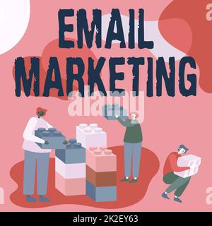 Hand writing sign Email Marketing. Internet Concept Sending a commercial message to a group of showing using mail Colleagues Displaying Cube Representing Teamwork Discussing Future Project. Stock Photo