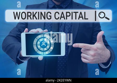 Conceptual caption Working Capital. Conceptual photo Working Capital Man holding Screen Of Mobile Phone Showing The Futuristic Technology. Stock Photo