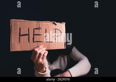 Stop violence against women. Help concept. Stock Photo