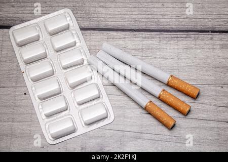 nicotine gums and cigarettes Stock Photo