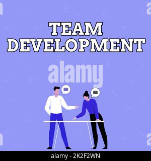 Text sign showing Team Development. Business approach learn why and how small groups change over time with graphs Partners Sharing New Ideas For Skill Improvement Work Strategies. Stock Photo