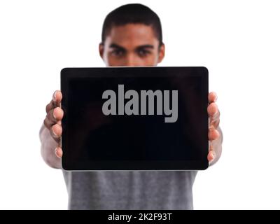 Smart technology makes everything easier. a young man holding a digital tablet. Stock Photo