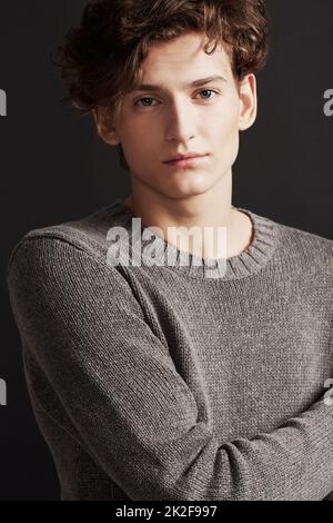 Honest eyes. A young man with elegant facial features wearing the latest in winter fashions. Stock Photo