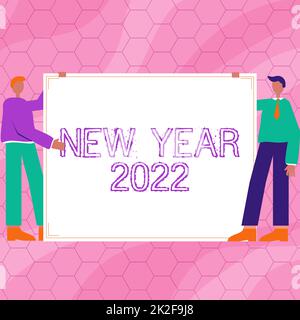 Conceptual caption New Year 2022. Concept meaning Greeting Celebrating Holiday Fresh Start Best wishes Two Men Drawing With Empty Paper Background Presenting New Ideas. Stock Photo
