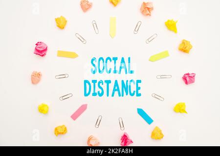 Writing displaying text Social Distance. Word Written on maintaining a high interval physical distance for public health safety Multiple Assorted Collection Office Stationery Photo Placed Over Table Stock Photo