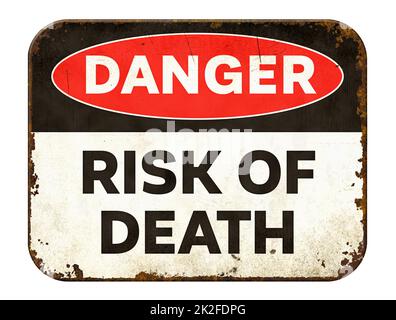 Vintage tin danger sign on a white background - Risk of death Stock Photo