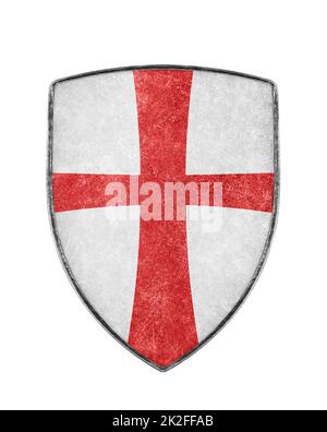 Old metal crusaders shield with red cross isolated on white background Stock Photo