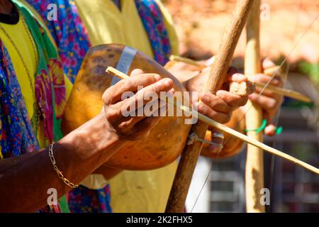 Berimbau player during presentation of Brazilian capoeira Stock Photo