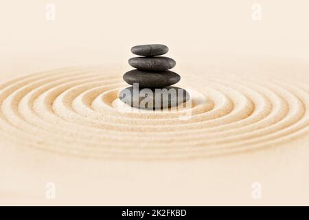 Zen japanese garden and black stones background Stock Photo