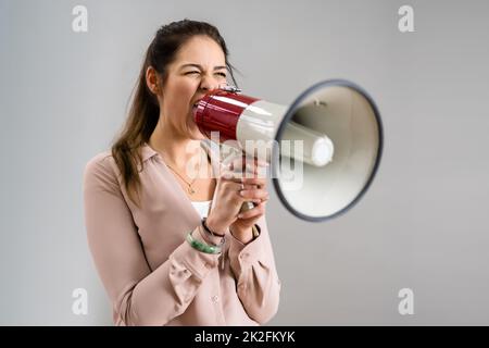 People Shout And Scream Through Megaphone Stock Photo