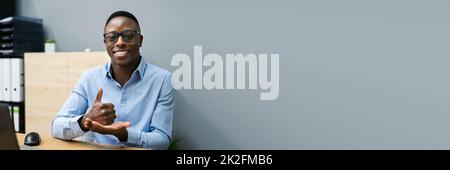 African American Man Learning Sign Language Stock Photo