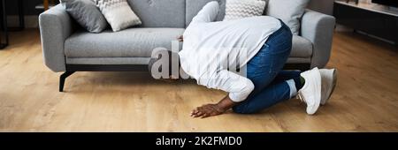 Lost Something. Looking For Keys Stock Photo