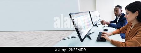 Businesspeople Checking Spreadsheet On Screen Stock Photo