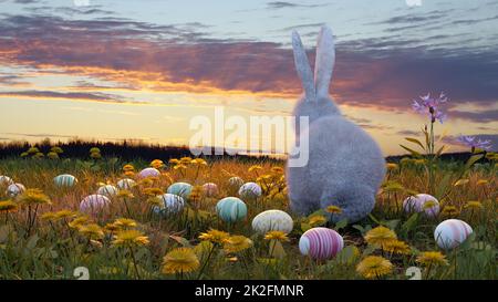 easter bunny rabbit decorated eggs in spring meadow sunset light and flowers 3D illustration Stock Photo