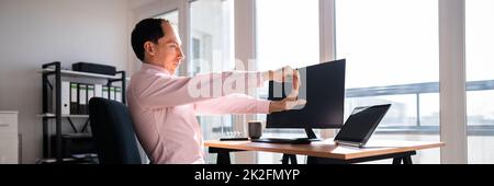 Stretching Office Workout. Desk Stretch Exercise Stock Photo