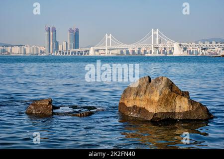 Gwangan Bridge and skyscrapers in Busan, South Korea Stock Photo