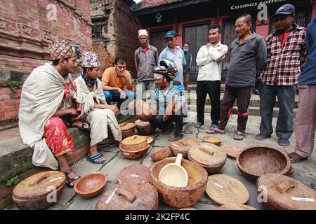 Nepal. 23rd Sep, 2022. People from Raute community sells their wooden crafts in the ''˜Raute Exhibition' program held at Bhaktapur on Friday. The last nomadic ethnic group of Nepal, Raute are known for living in forest and hunting monkeys. They are one of the endangered community of South Asia. They live in temporary tents in remote parts of the forest. While they have a talent for crafting wood and creating striking household utensils, they use it to barter for food-grains with the local people. At present, government provides them certain amount as social security allowances. (Credit Stock Photo