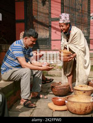 Nepal. 23rd Sep, 2022. People from Raute community sells their wooden crafts in the ''˜Raute Exhibition' program held at Bhaktapur on Friday. The last nomadic ethnic group of Nepal, Raute are known for living in forest and hunting monkeys. They are one of the endangered community of South Asia. They live in temporary tents in remote parts of the forest. While they have a talent for crafting wood and creating striking household utensils, they use it to barter for food-grains with the local people. At present, government provides them certain amount as social security allowances. (Credit Stock Photo