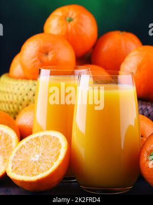 Glasses with freshly squeezed orange juice Stock Photo