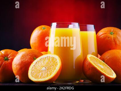 Glasses with freshly squeezed orange juice Stock Photo